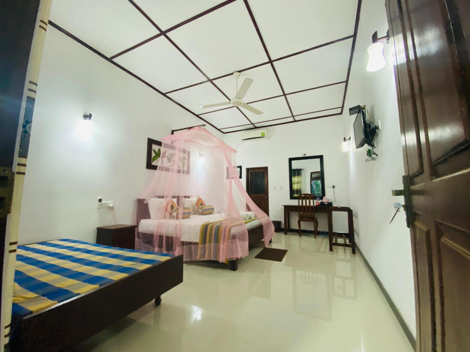Winmi Resort Habarana Chambre photo